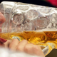 Man drinking large stein of beer